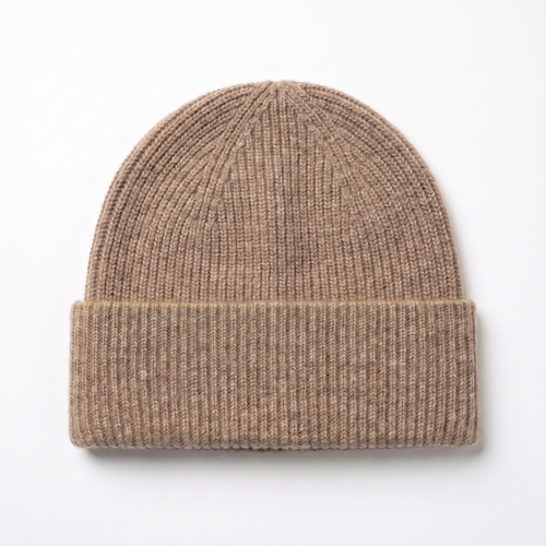 FRUAA undyed 100% cashmere beanie in Natural Beige — studio front view