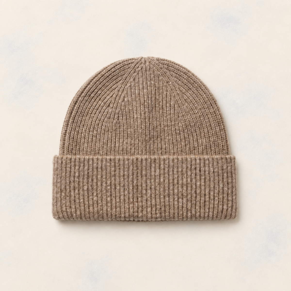 FRUAA Natural cashmere beanie on a washed cream backdrop, beige color matched to Yellow Line