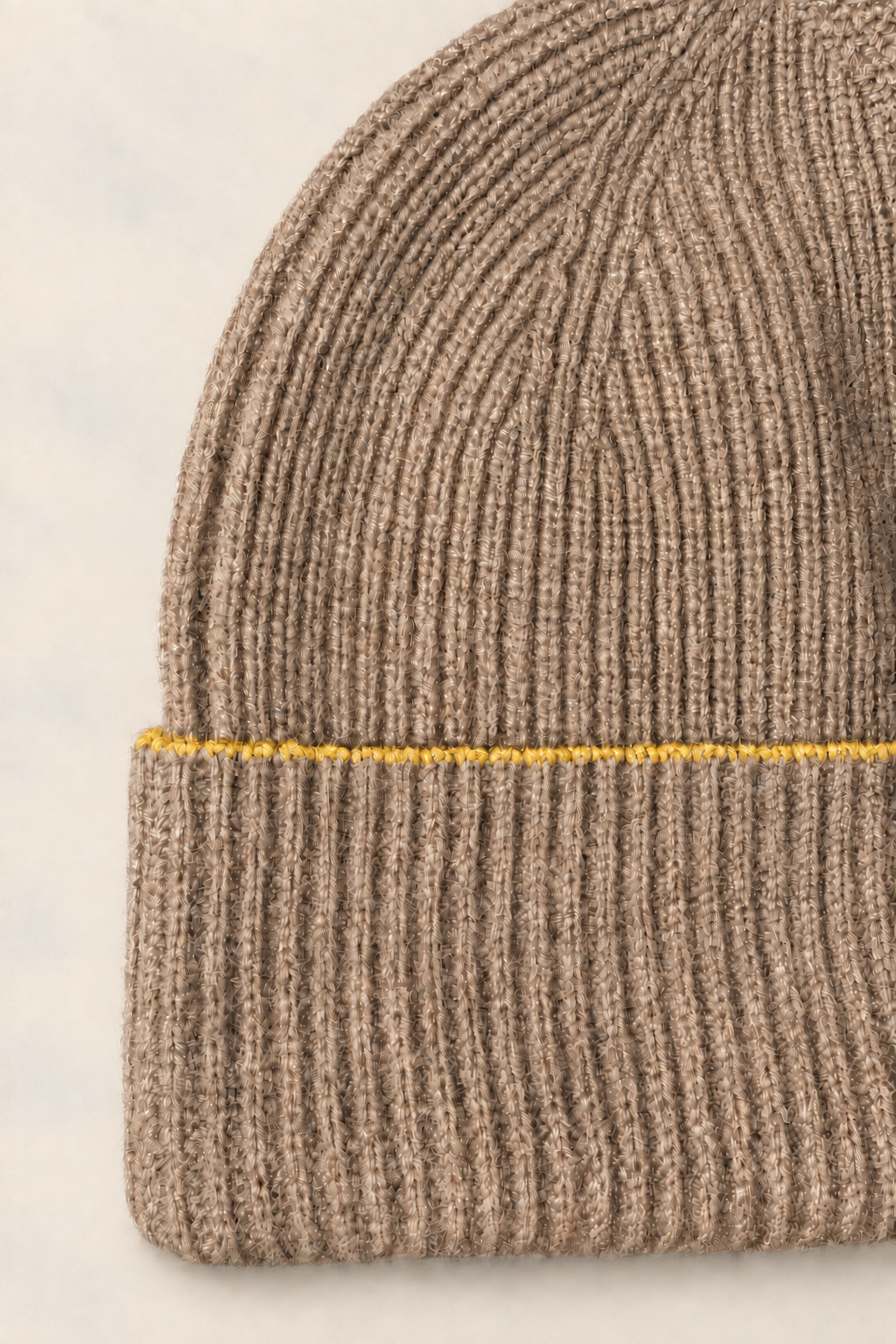 FRUAA Yellow Line cashmere knit and folded cuff detail on a washed cream background