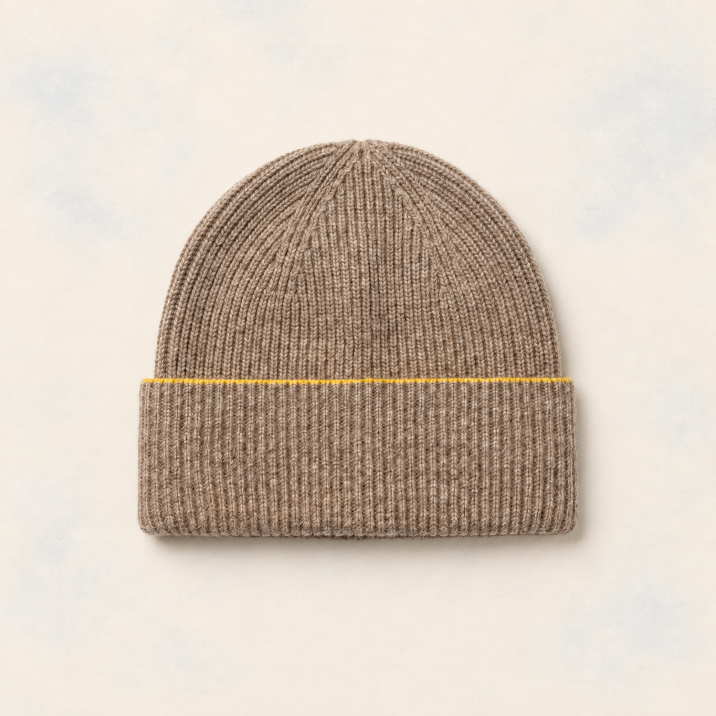 FRUAA Yellow Line cashmere beanie on a washed cream backdrop